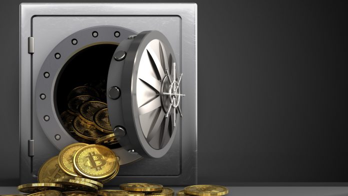 Picture of bitcoins pouring out of a vault
